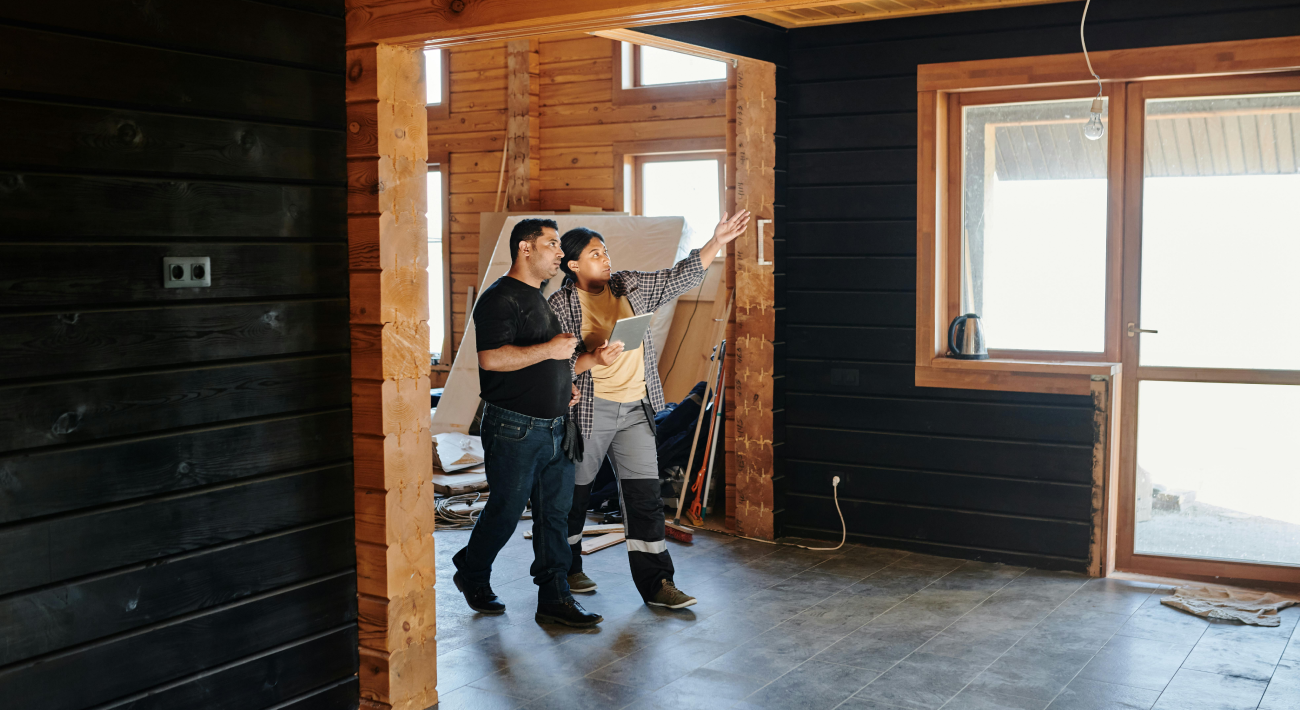Feng Shui work. Renovations inside a wooden house with dark walls.